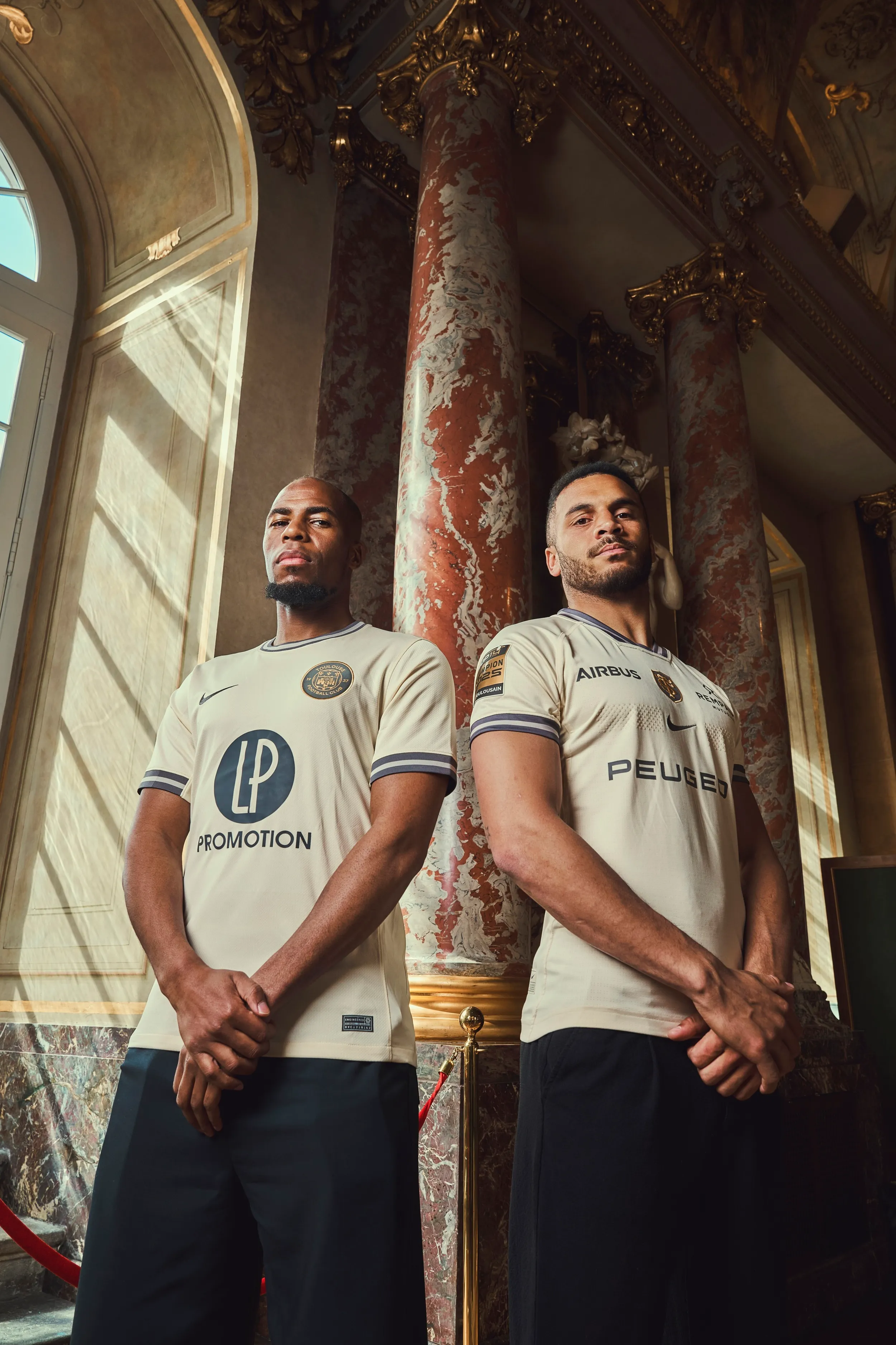 Djibril Sidibé et Matthis Lebel portant le maillot Capitolium